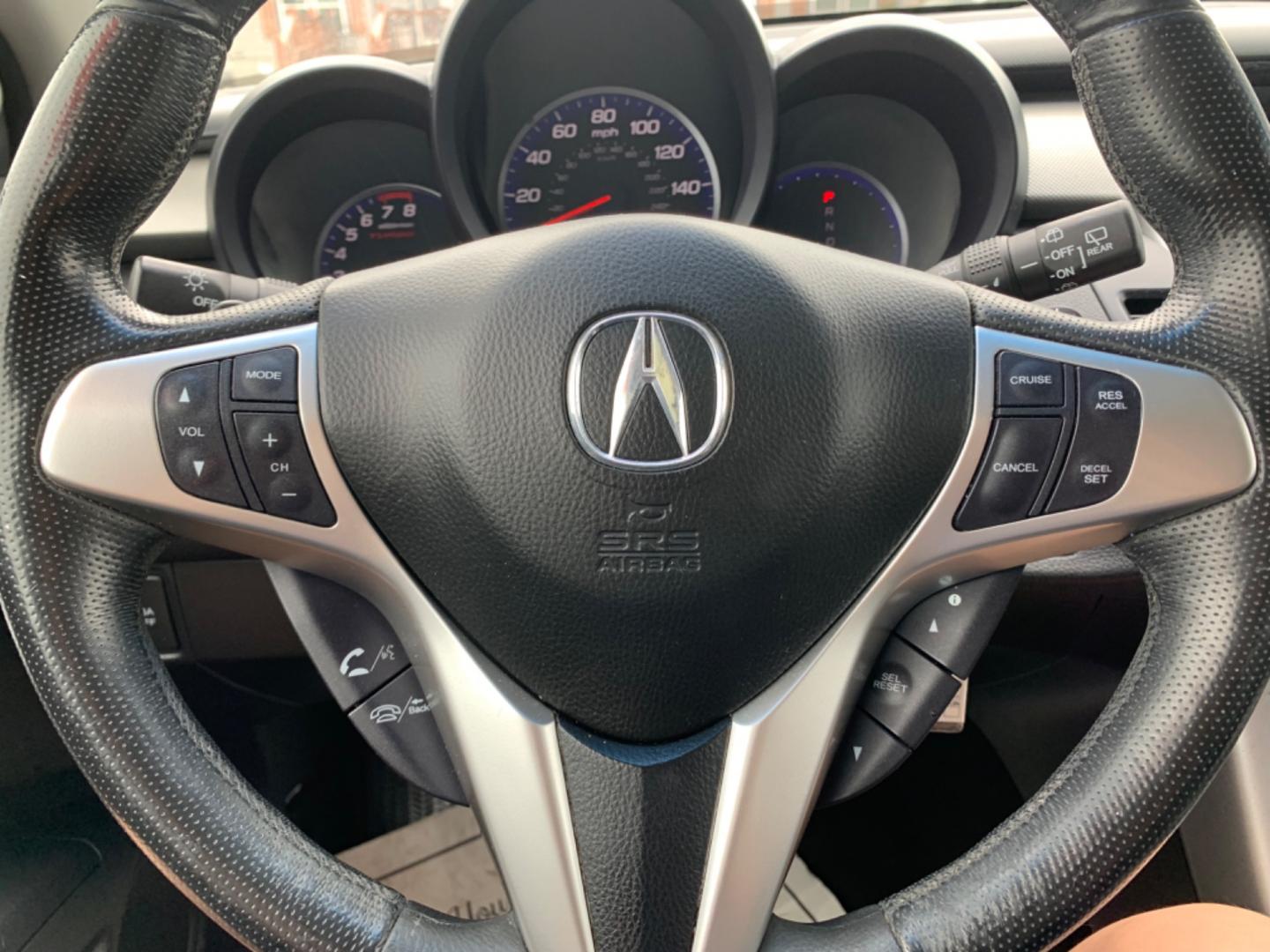 2009 Silver /Black Acura RDX (5J8TB18239A) with an 2.3L L4 DOHC 16V engine, Automatic transmission, located at 1830 North Belt Line Road, Irving, TX, 75061, (469) 524-0199, 32.834373, -96.993584 - Photo#14